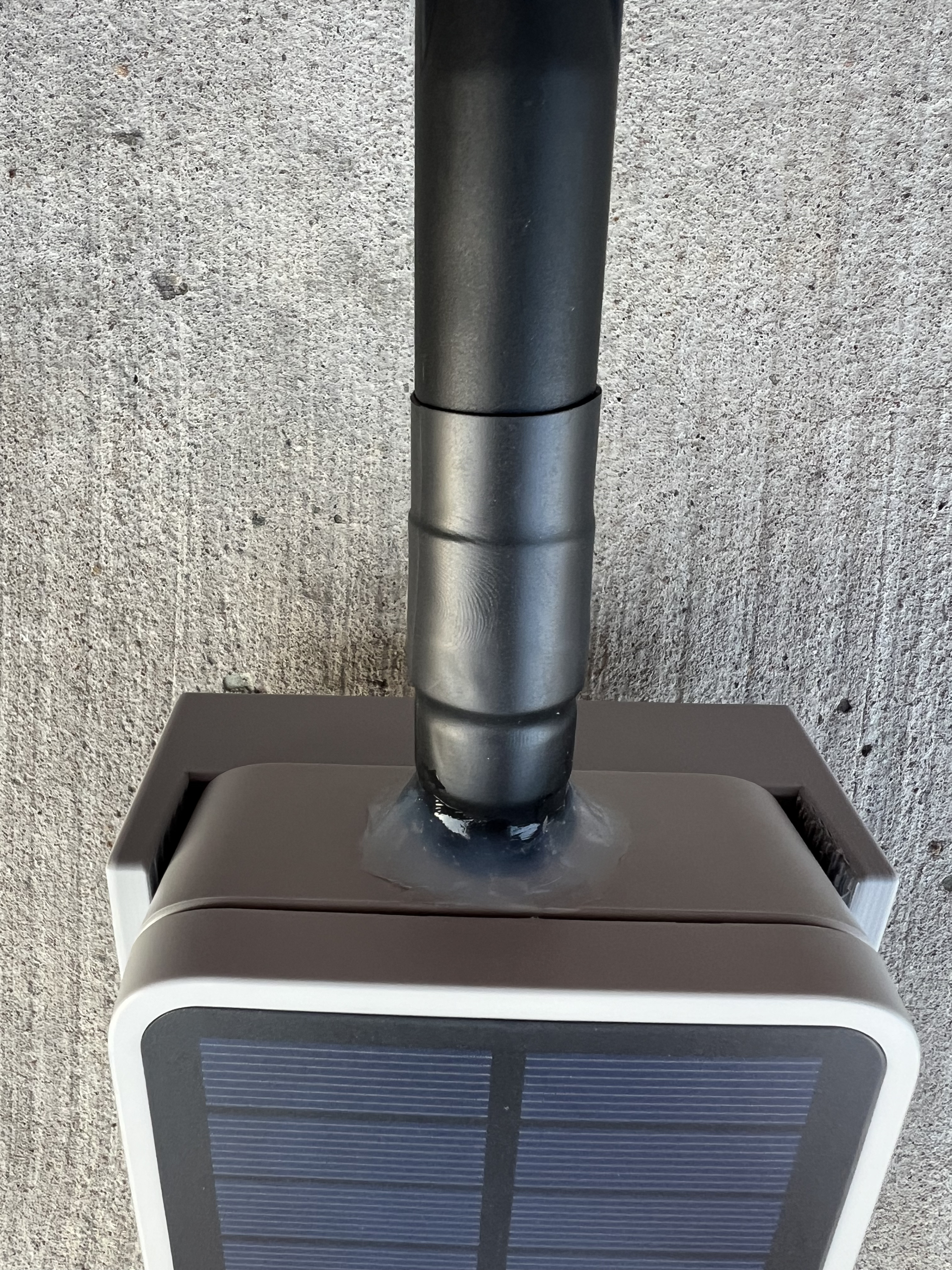 Gaine thermorétractable autour d’un raccord d’antenne extérieur